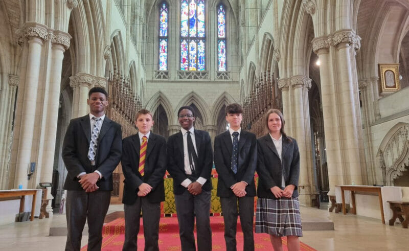 On Sunday 18th June 2023, five Downside School pupils - Oliver, Ryan, Johnny, Ottilie, Akaniro - received Holy Communion for the first time during Mass in the Abbey Church.