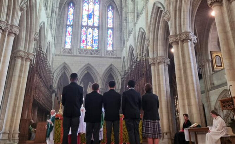 On Sunday 18th June 2023, five Downside School pupils - Oliver, Ryan, Johnny, Ottilie, Akaniro - received Holy Communion for the first time during Mass in the Abbey Church.
