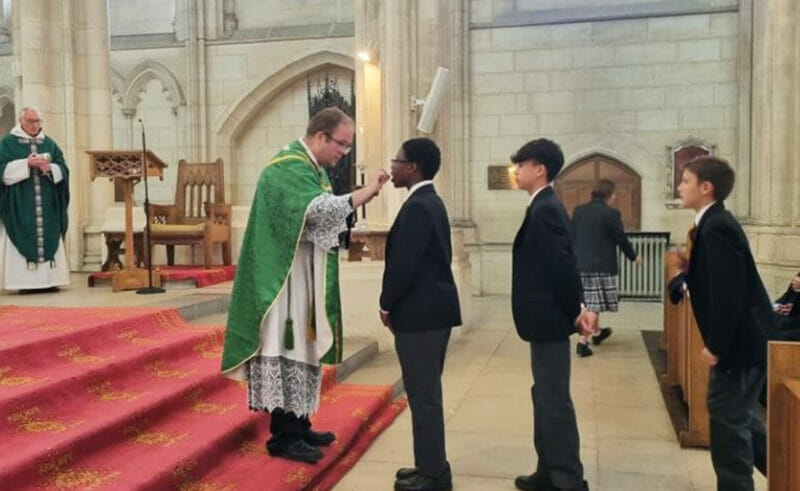 On Sunday 18th June 2023, five Downside School pupils - Oliver, Ryan, Johnny, Ottilie, Akaniro - received Holy Communion for the first time during Mass in the Abbey Church.