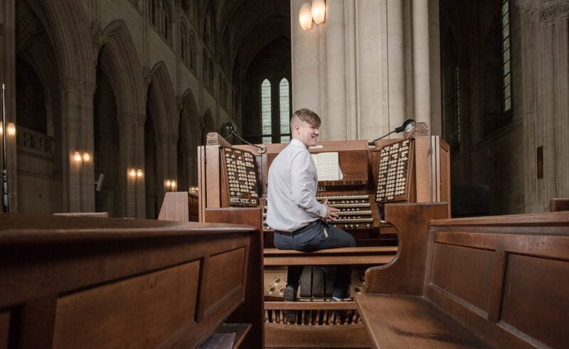 Downside School's Matt Walters plays at Downside Abbey